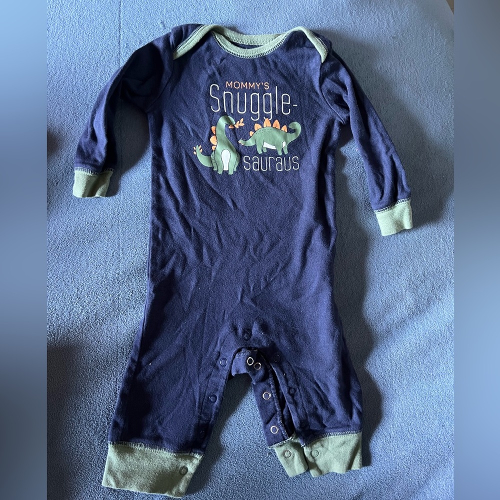 Logs, sleeve pants, one piece pajamas. Mama snuggle saurus. Dinosaur pajamas.